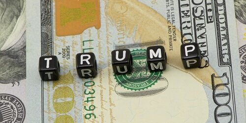 Trump word on dollars background