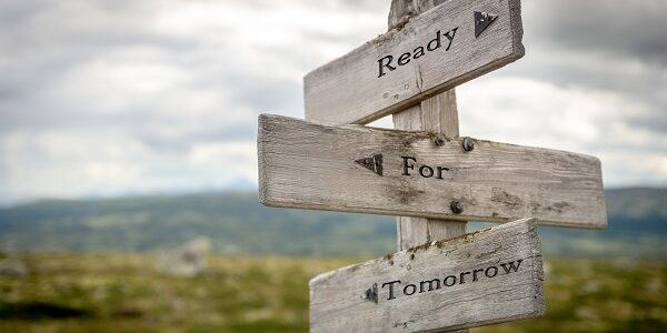ready for tomorrow text on wooden signpost outdoors in nature