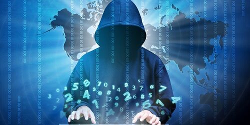 Computer hacker silhouette of hooded man