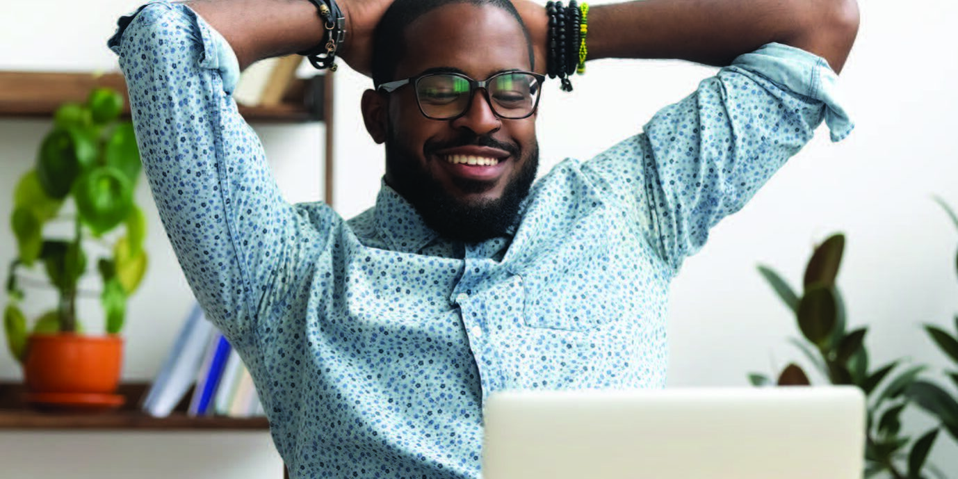 Man sitting in front of laptop